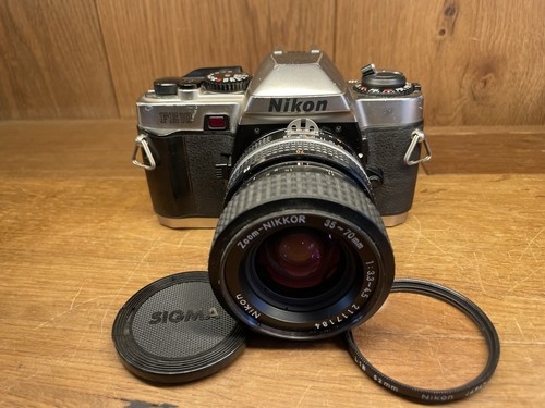 Near mint nikon fe10 film - mint*,